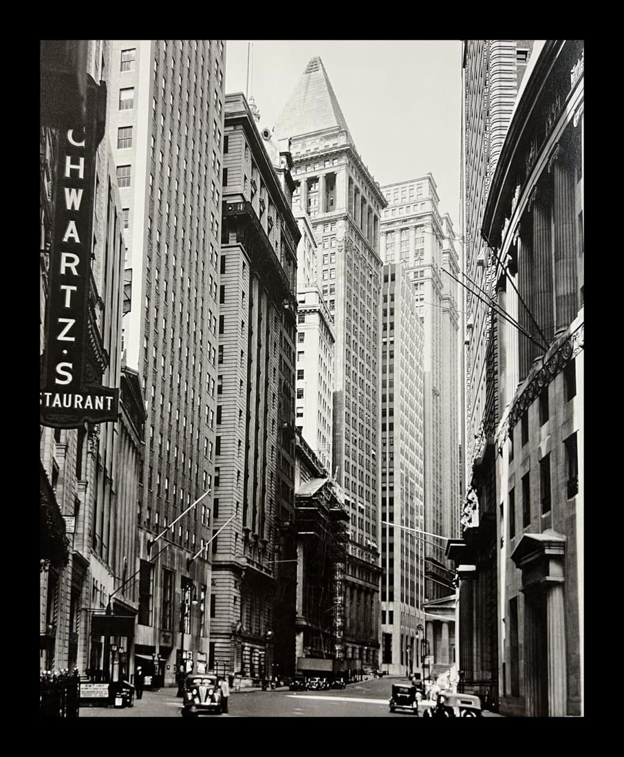 Berenice Abbott, Broad Street, Looking Toward Wall Street, 1930s: Photographer: Berenice Alice Abbott was an American photographer best known for her portraits of between-the-wars 20th century cultural figures, New York City photographs of architecture and urban des