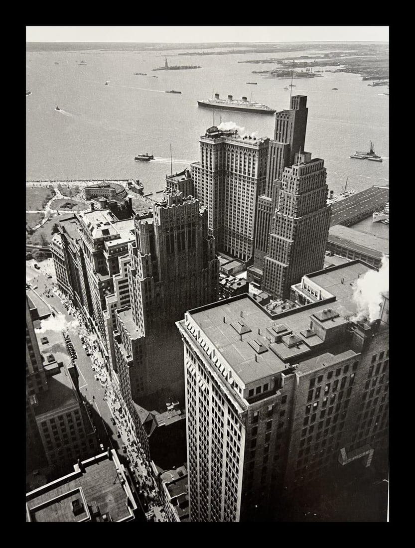 Berenice Abbott, Broadway To The Battery, 1930s: Photographer: Berenice Alice Abbott was an American photographer best known for her portraits of between-the-wars 20th century cultural figures, New York City photographs of architecture and urban des