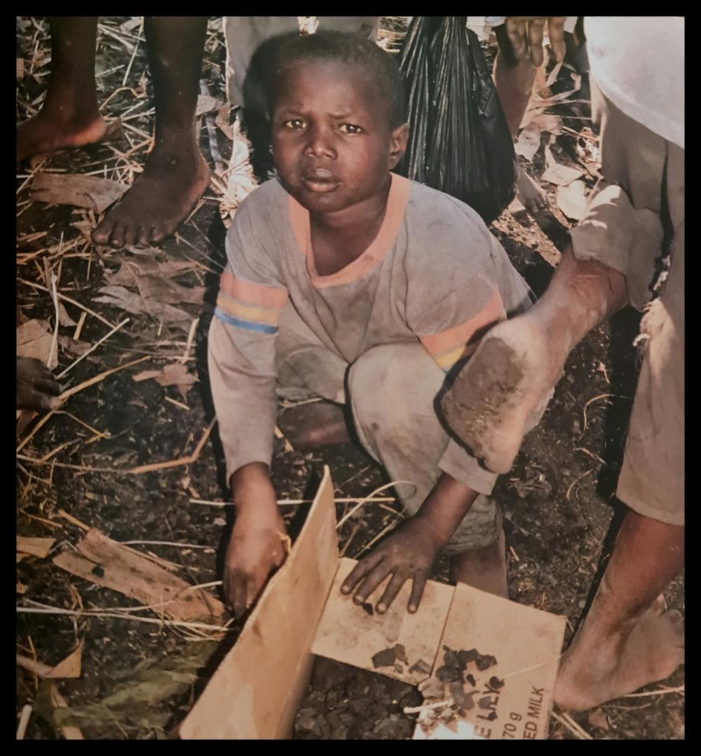 Michel Compte, Children collecting charcoal for fires, Haiti, 1997: Photographer: Michel Comte (born 19 February 1954) is a Swiss artist, filmmaker, fashion and portrait photographer. Subject/Title: Frida Kahlo Date Of Negative: 1997 Type Of Print: Sheet Fed Photograv