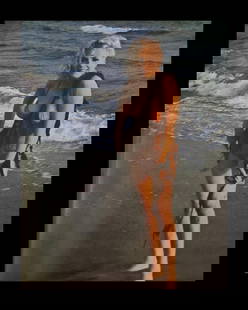 Marilyn Monroe wearing seaweed on the beach: Photographer: George Barris Subject/Title: Marilyn Monroe wearing seaweed on the beach Date Of Negative: Undated Type Of Print: Authentic Vintage Sheet Fed Photogravure/Heliogravure Date Of Print: 200