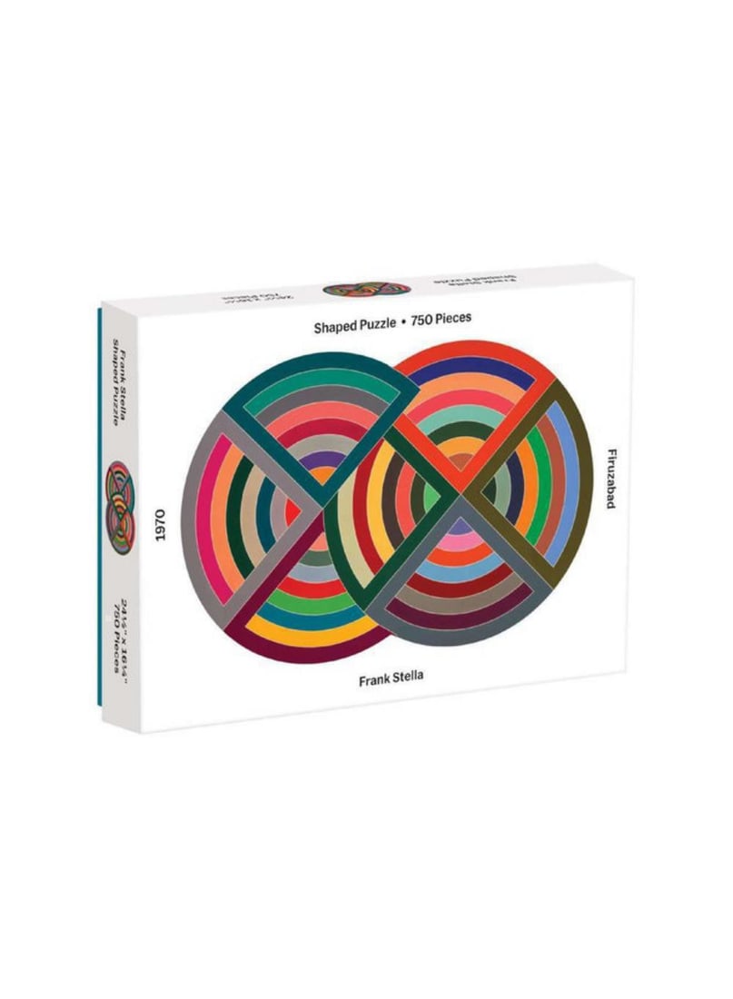Frank Stella Jigsaw Shaped Puzzle: The MoMA Frank Stella Shaped Puzzle features the artistâ€™s colorful geometric painting, Firuzabad Artist: Frank Stella 750 Pieces Puzzle Size: 24.5 x 16.25" Box Size: 11.375 x 8.375 x 2", 289 x