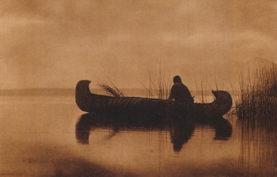 Edward S. Curtis, PLATE 21 Kutenai Duck Hunter, CA, 1910: Photographer: Edward S. Curtis (American, 1868 - 1952) - renowned photographer of the American West and the Native American Indian. Title: FIG. 45 Curtis Studio, (Edward S. Curtis and His Daughter Bet