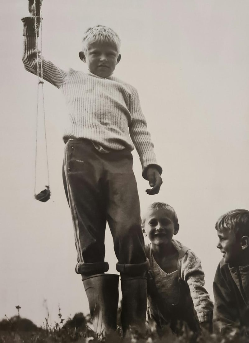 Michel Compte, Boy playing with a sling in Bosnia, 1996: Photographer: Michel Comte (born 19 February 1954) is a Swiss artist, filmmaker, fashion and portrait photographer. Subject/Title: Frida Kahlo Date Of Negative: 1996 Type Of Print: Sheet Fed Photograv