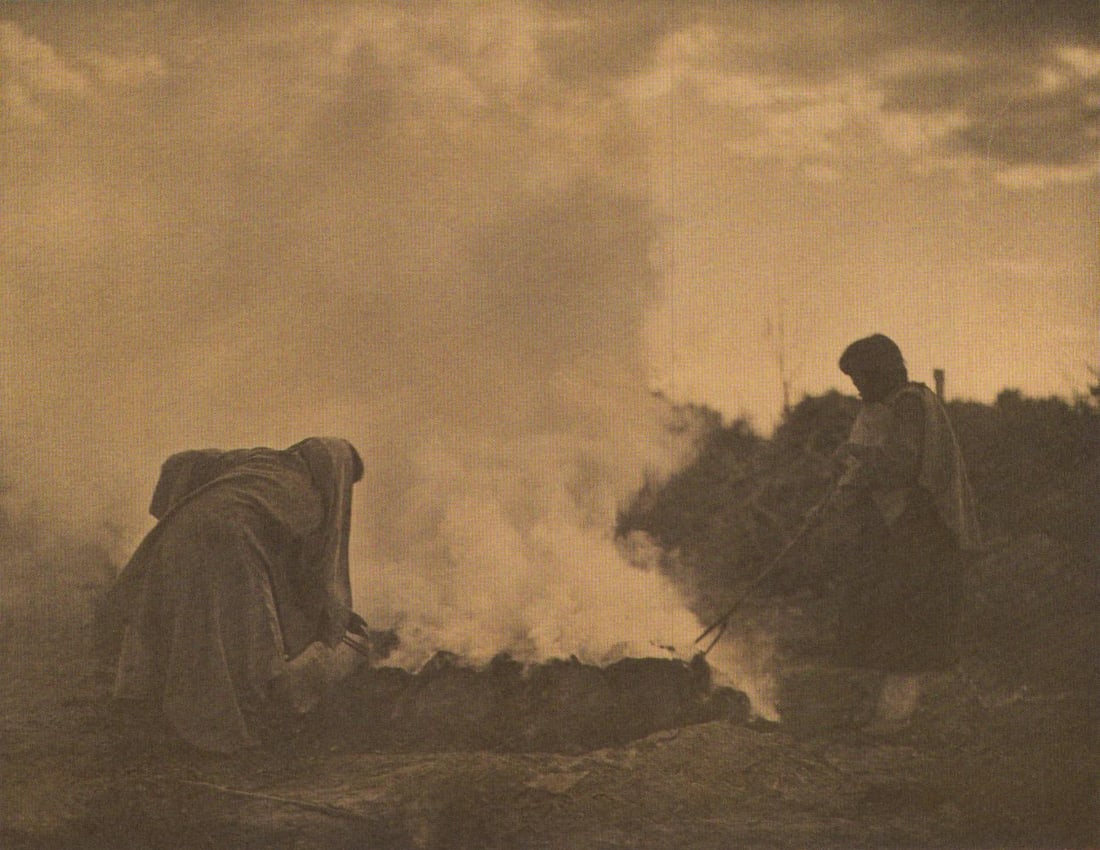 EDWARD S. CURTIS, PLATE 26 POTTERY BURNERS AT SANTA CLARA0 TEWA, CA, 1905: Photographer: Edward S. Curtis (American, 1868 - 1952) - renowned photographer of the American West and the Native American Indian. Title: FIG. 45 Curtis Studio, (Edward S. Curtis and His Daughter Bet
