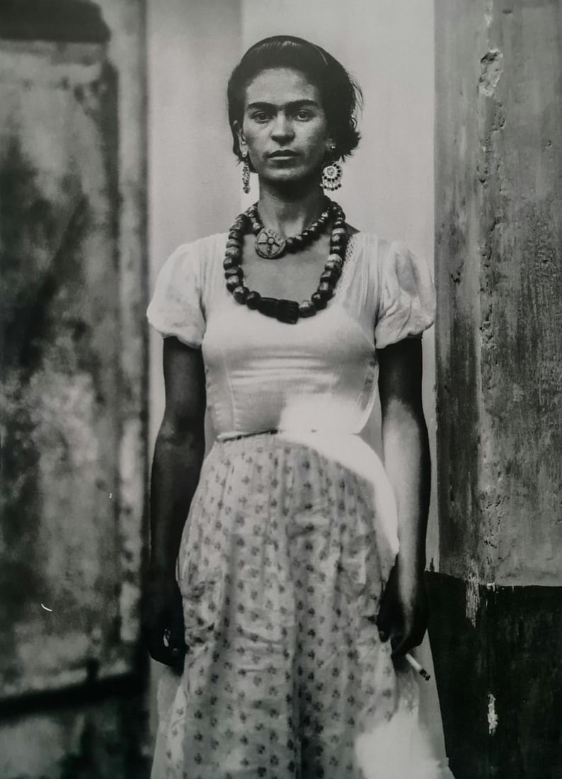 Frida Kahlo, Arms At Her Side: Subject: Arms at her side Subject/Title- Frida Kahlo Photos Type Of Print: Authentic Vintage Sheet Fed Photogravure/Heliogravure Date Of Print: 2021 Publisher: Taschen GmbH Paper: Medium weight, clay 