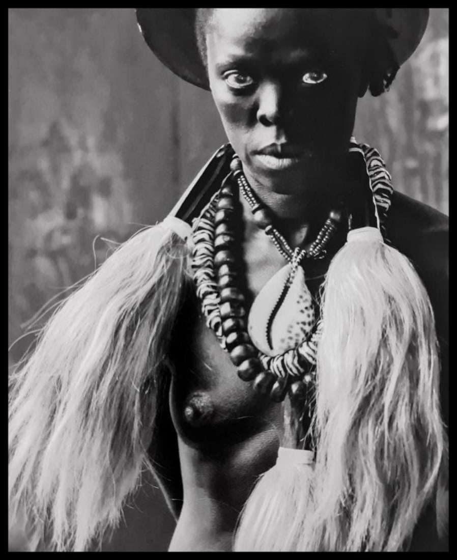 Zanele Muholi, MaID in Harlem, African Market, 116th Street, New York, 2015: Photographer: Zanele Muholi was born in 1972. She is a South African photographer and filmmaker. Title: MaID in Harlem, African Market, 116th Street, New York, 2015, 6.5 x 8 Date Of Negative: 2015 Typ