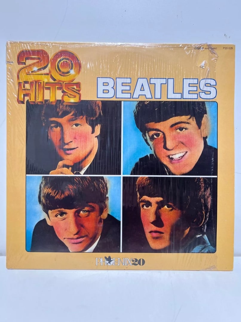 The Beatles, '20 Hits LP' , Vinyl Record: Artist: The Beatles Title: 20 Hits LP Type: Vinyl The Beatles were an English rock band formed in Liverpool in 1960, comprising John Lennon, Paul McCartney, George Harrison and Ringo Starr. They are r