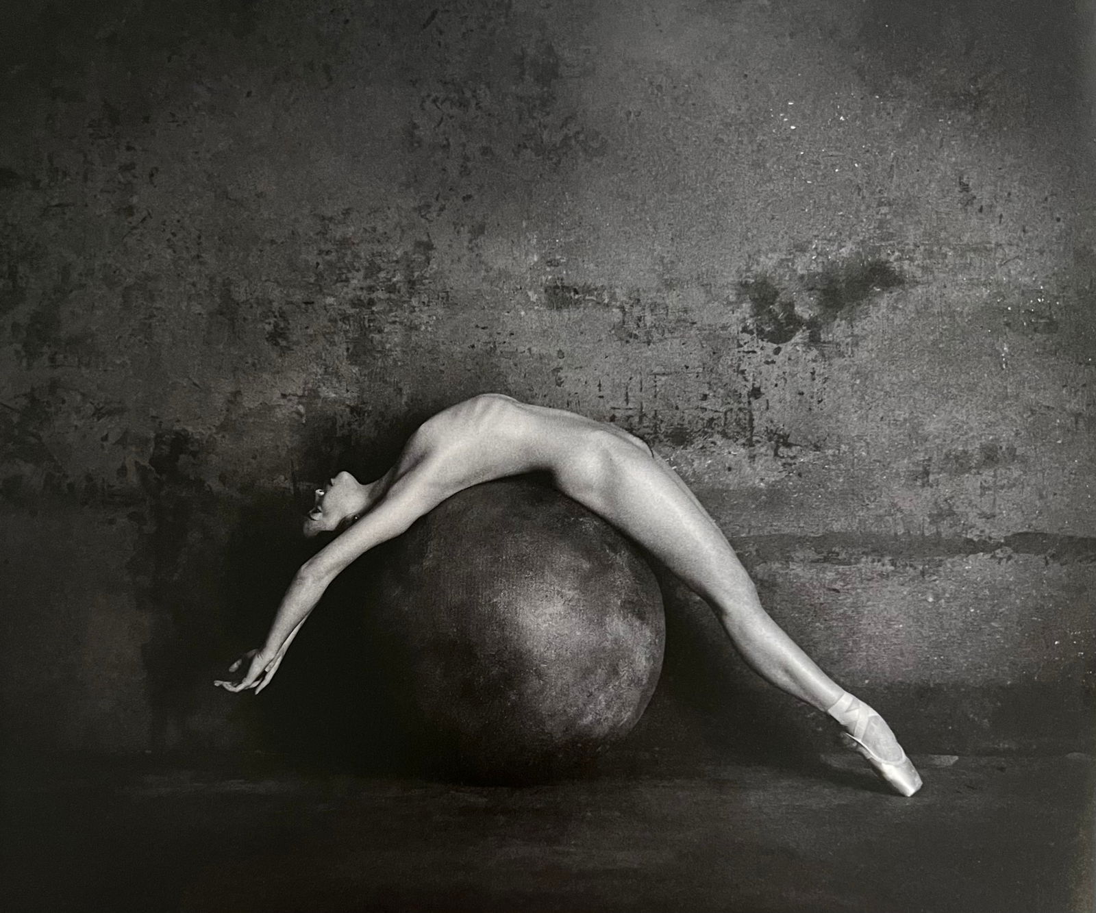 Marc Lagrange, Ball Bearing, 2013: Photographer: Marc Lagrange was a Belgian photographer known for his nude portraits of female figures. Lagrange created dream-like and fantastical narrative pictures populated by beautiful nudes that