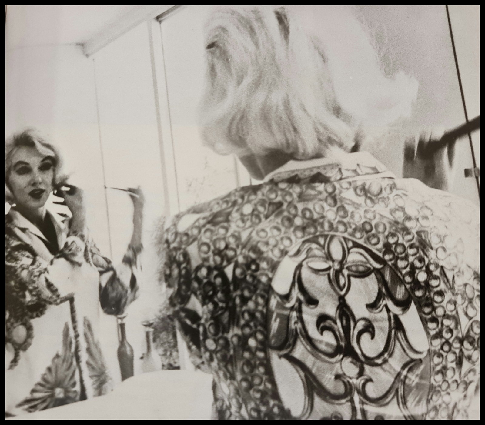 Marilyn Monroe doing her hair: Photographer: George Barris Subject/Title: Marilyn Monroe doing her hair Date Of Negative: Undated Type Of Print: Authentic Vintage Sheet Fed Photogravure/Heliogravure Date Of Print: 2000 Publisher: t