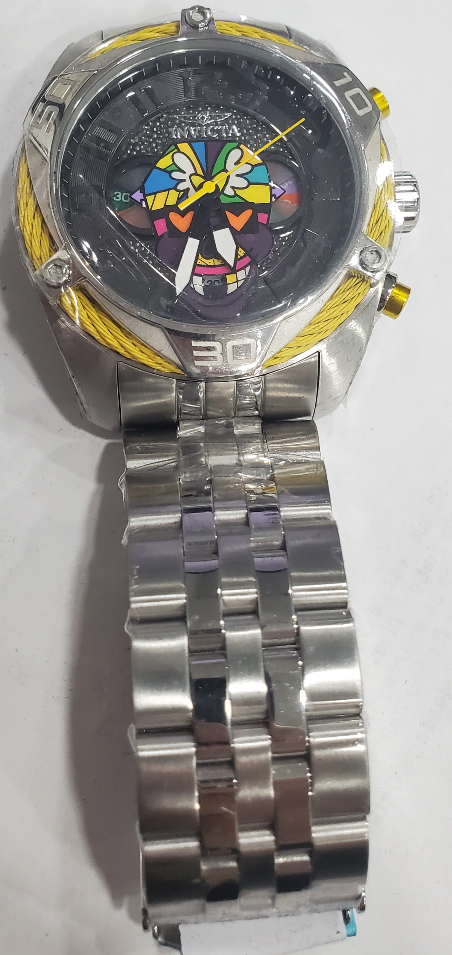 Romero Britto, Limited Edition Invicta Watch: Artist: Romero Britto Type: Quartz Watch Limited Edition Watch Comes With the Original Romero Britto Box Length- 9 Inches Condition- Very Good! Like New, never worn Buyer's Premium 25%