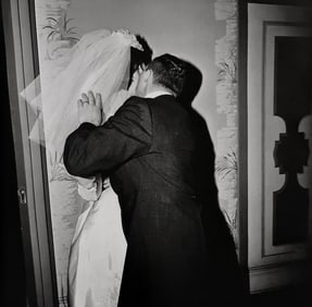 Diane Arbus, Groom kissing he bride, N.Y.C., 1965