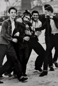 Diane Arbus, Masked boy with friends, Coney Island, N.Y., 1956