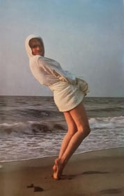 Marilyn Monroe in robe on the beach