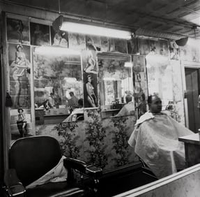 Diane Arbus, Pin-up collection at a barber shop, N.Y.C., 1963