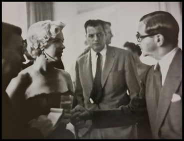 Marilyn Monroe and Irving Berlin at a party