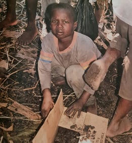 Michel Compte, Children collecting charcoal for fires, Haiti, 1997
