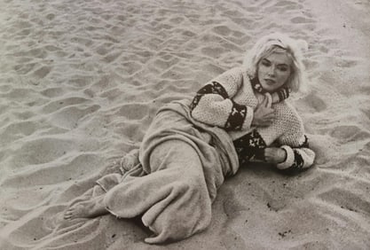 Marilyn Monroe in repose on beach
