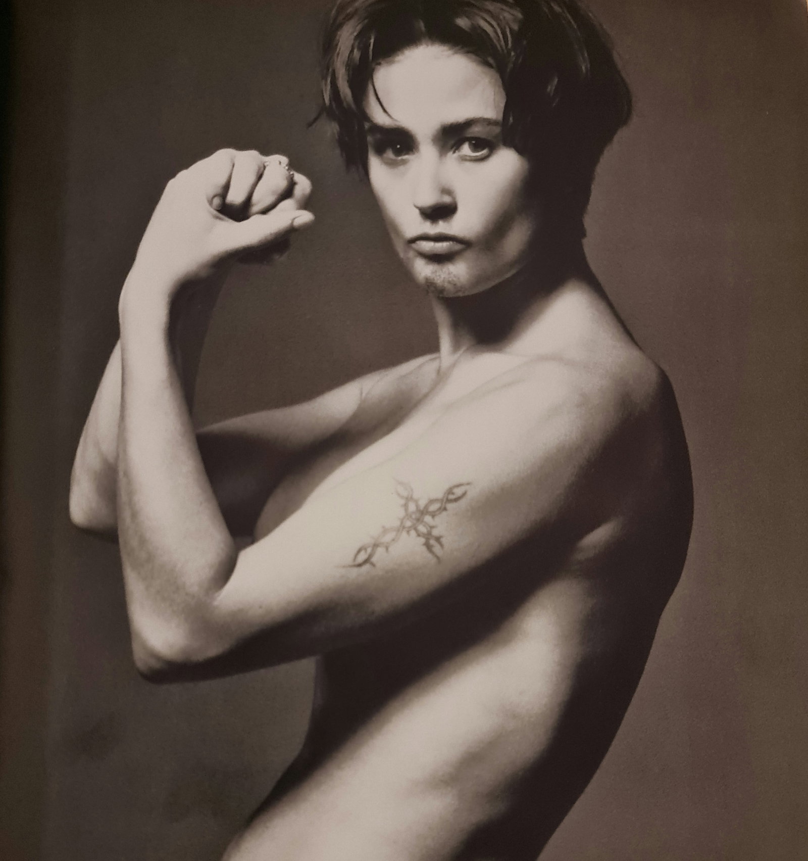 Michel Compte, Demi Moore imitating goatee, 1993: Photographer: Michel Comte (born 19 February 1954) is a Swiss artist, filmmaker, fashion and portrait photographer. Subject/Title: Frida Kahlo Date Of Negative: 1993 Type Of Print: Sheet Fed Photograv