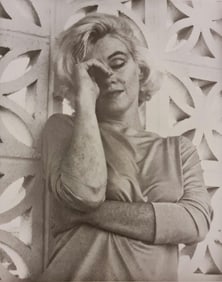 Marilyn Monroe with her eyes closed