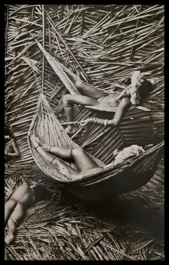 Sebastiao Salgado, Zo'e women collecting Urucum fruit, Para, Brazil, 2009: Photographer: Sebastiao Ribeiro Salgado Junior is a Brazilian social documentary photographer and photojournalist. He has traveled to over 120 countries for his photographic projects. Most of these ha