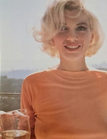 Marilyn Monroe enjoying a glass of wine