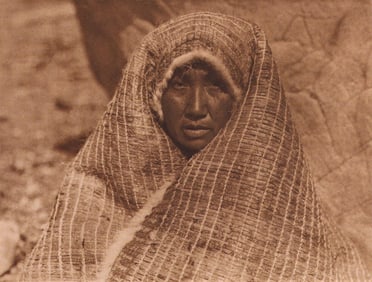 Edward S. Curtis, PLATE 48 Nootka Woman Wearing Cedar Bark Blanket, CA, 1915