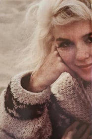 Marilyn Monroe in a sweater on the beach