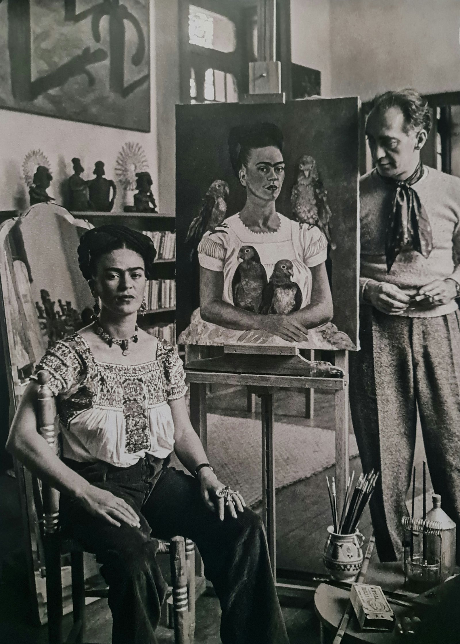 Frida Kahlo, Frida with self portrait: Subject: Frida with self portrait Subject/Title- Frida Kahlo Photos Type Of Print: Authentic Vintage Sheet Fed Photogravure/Heliogravure Date Of Print: 2021 Publisher: Taschen GmbH Paper: Medium weigh