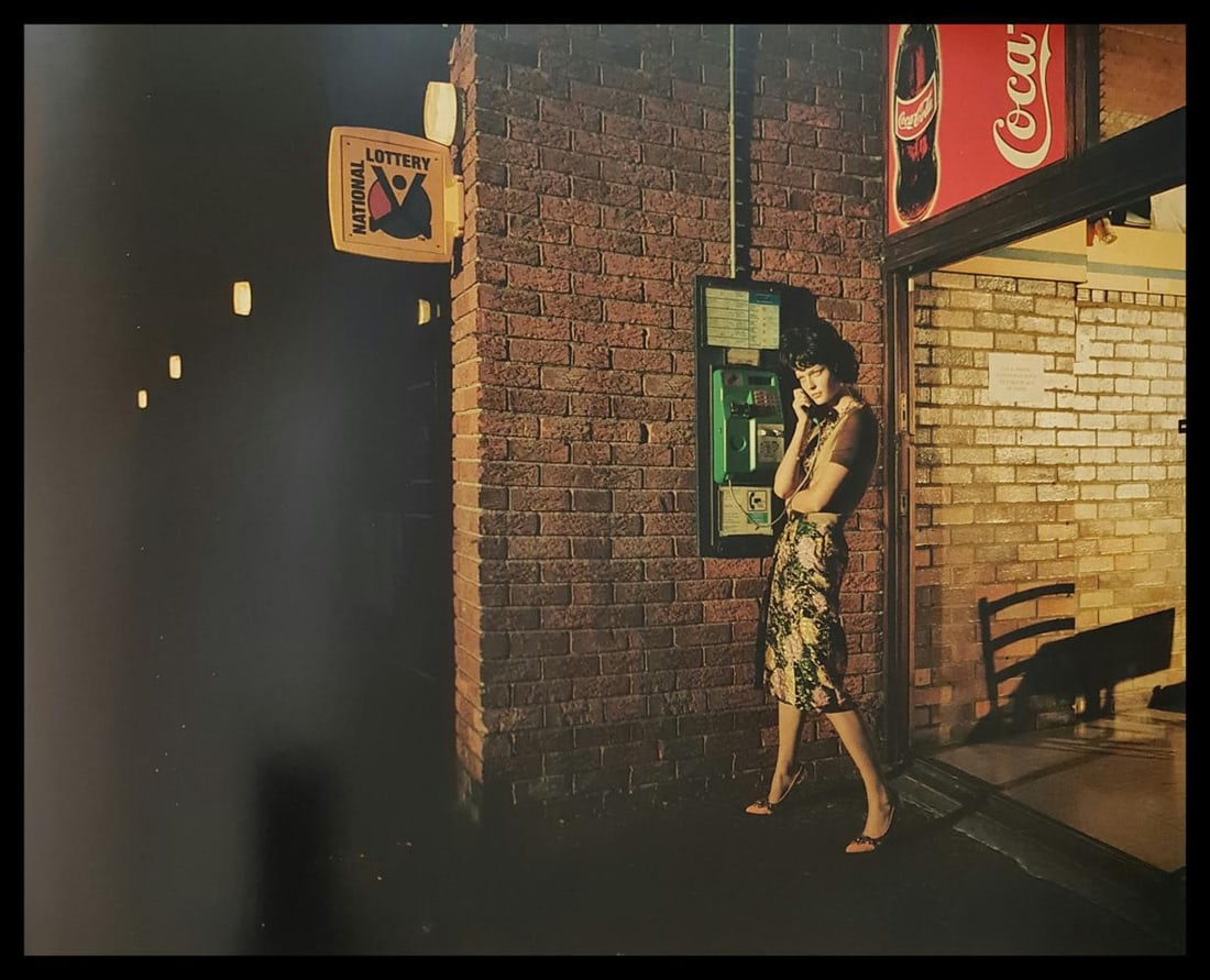 Jacques Olivar, Long Distance Call, Cape Town, 2003: Photographer: Jacques Olivar, born in Casablanca in 1941, was an advertising photographer and movie director before embracing fashion photography. Visual seduction and cinematic sensibility are keys t