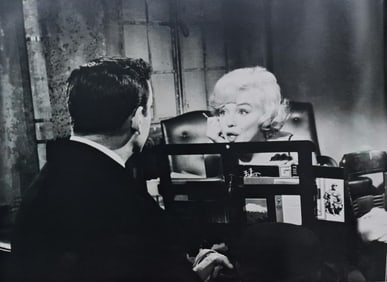 Marilyn Monroe with Yves Montand on movie set