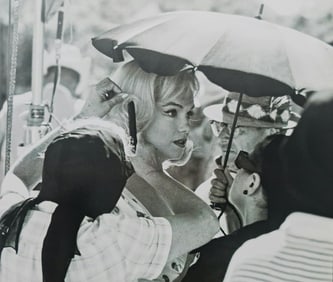 Marilyn Monroe on set of, 'The Misfits' getting her hair done