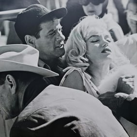 Marilyn Monroe being taken off set from, 'The Misfits', for exhaustion