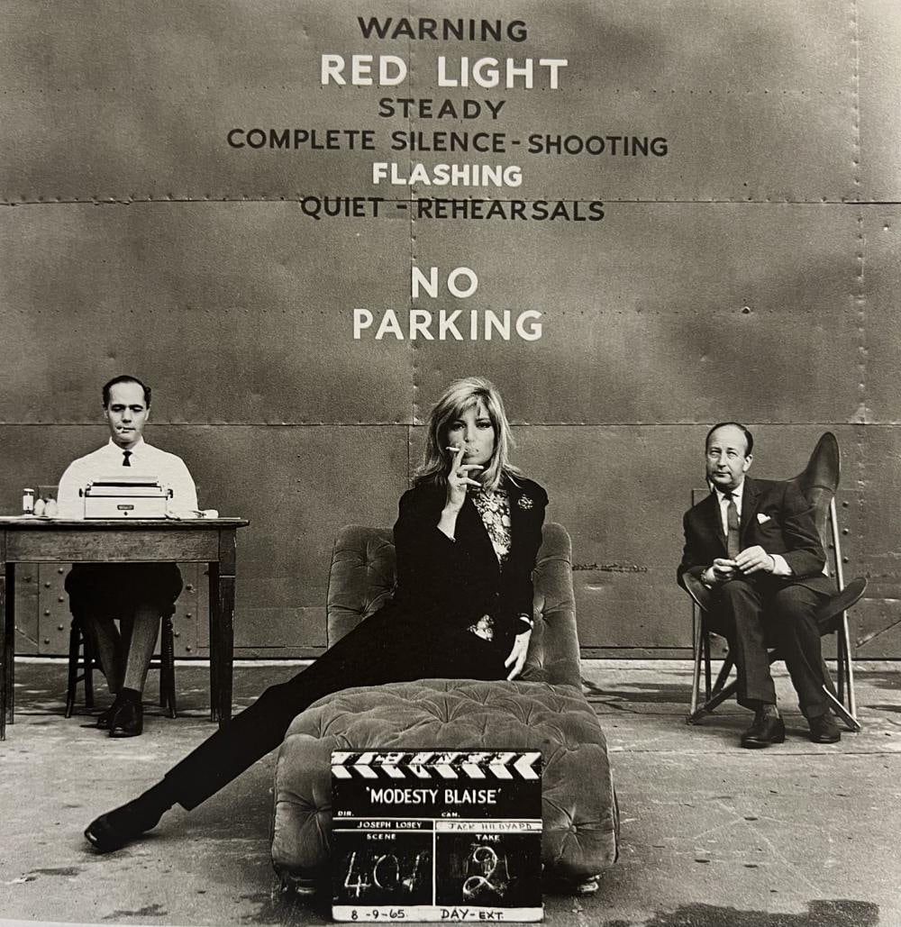 Terry O'Neill, Monica Vitti With Peter O'Donnel And Joseph Kanni At Shepperton Studios During The: Photographer: Terry ONeill was a British photographer, known for documenting the fashions, styles, and celebrities of the 1960s. Title: Monica Vitti with Peter O'Donnel and Joseph Kanni at Shepperton 