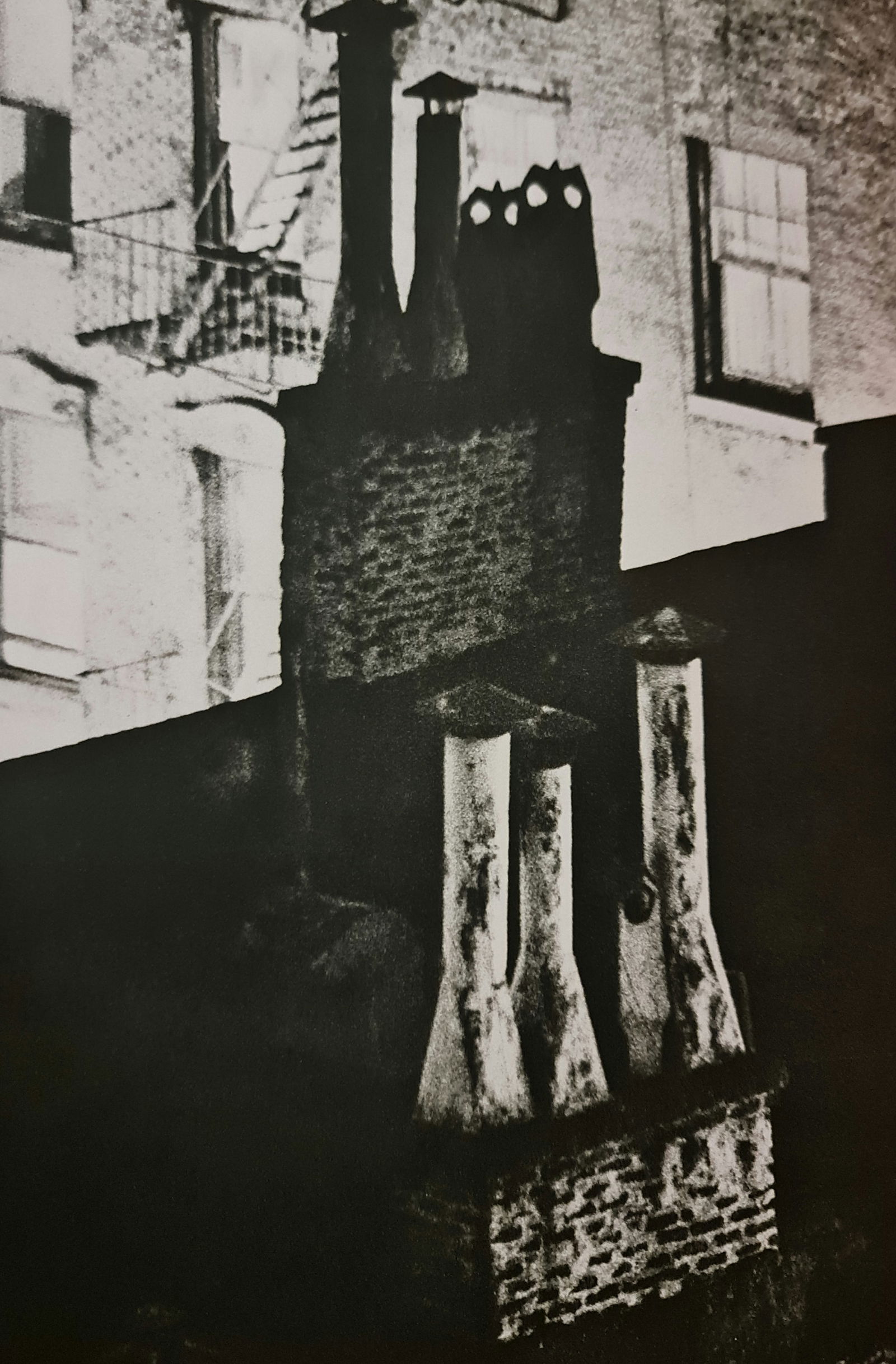 André Kertész, Chimneys, New York, 1966: Photographer: André Kertész, born Andor Kertész, was a Hungarian-born photographer known for his groundbreaking contributions to photographic composition and the photo essay. Subject: Chimneys, New