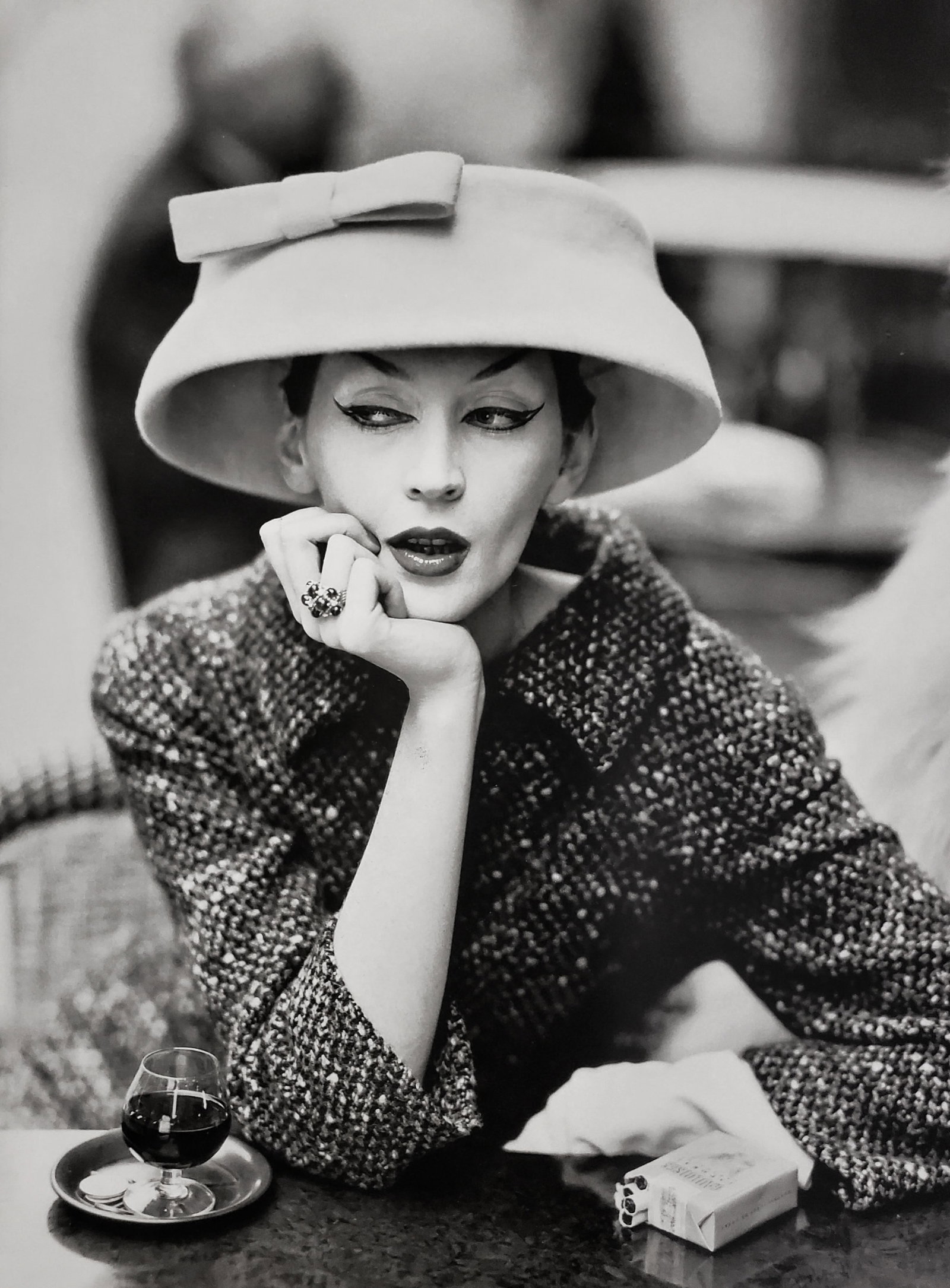 Richard Avedon, Dovima with Sacha, Cloche by Burenciaga, Cafe des Deux Magots, Paris, 1955: Photographer: Richard Avedon (American, 1923 - 2004) - internationally renowned portrait and fashion photographer, one of the most important and influential photographers during the last half of the t