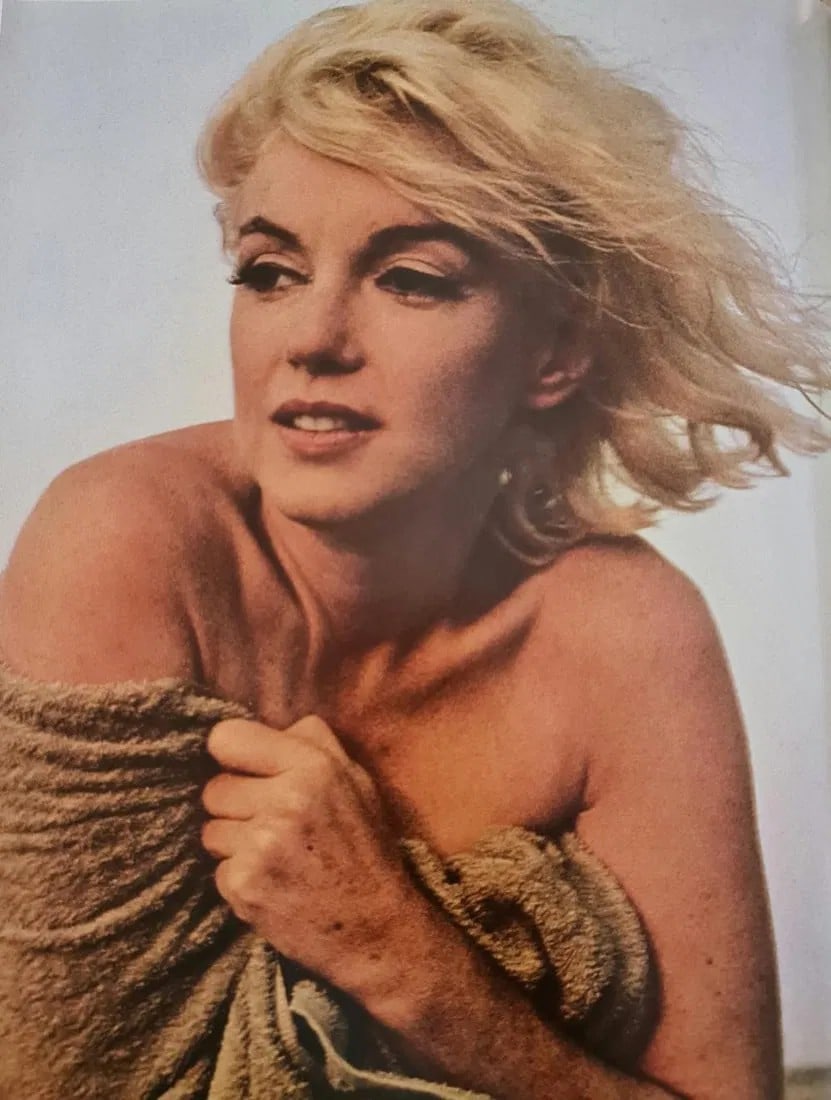 Marilyn Monroe in towel at the beach: Photographer: George Barris Subject/Title: Marilyn Monroe in towel at the beach Date Of Negative: Undated Type Of Print: Authentic Vintage Sheet Fed Photogravure/Heliogravure Date Of Print: 2000 Publi