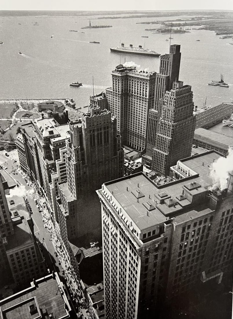 Berenice Abbott, Broadway To The Battery, 1930s: Photographer: Berenice Alice Abbott was an American photographer best known for her portraits of between-the-wars 20th century cultural figures, New York City photographs of architecture and urban des