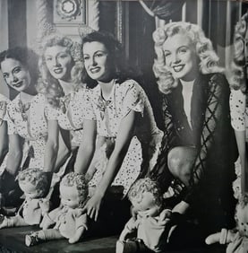 Marilyn Monroe behind a fence