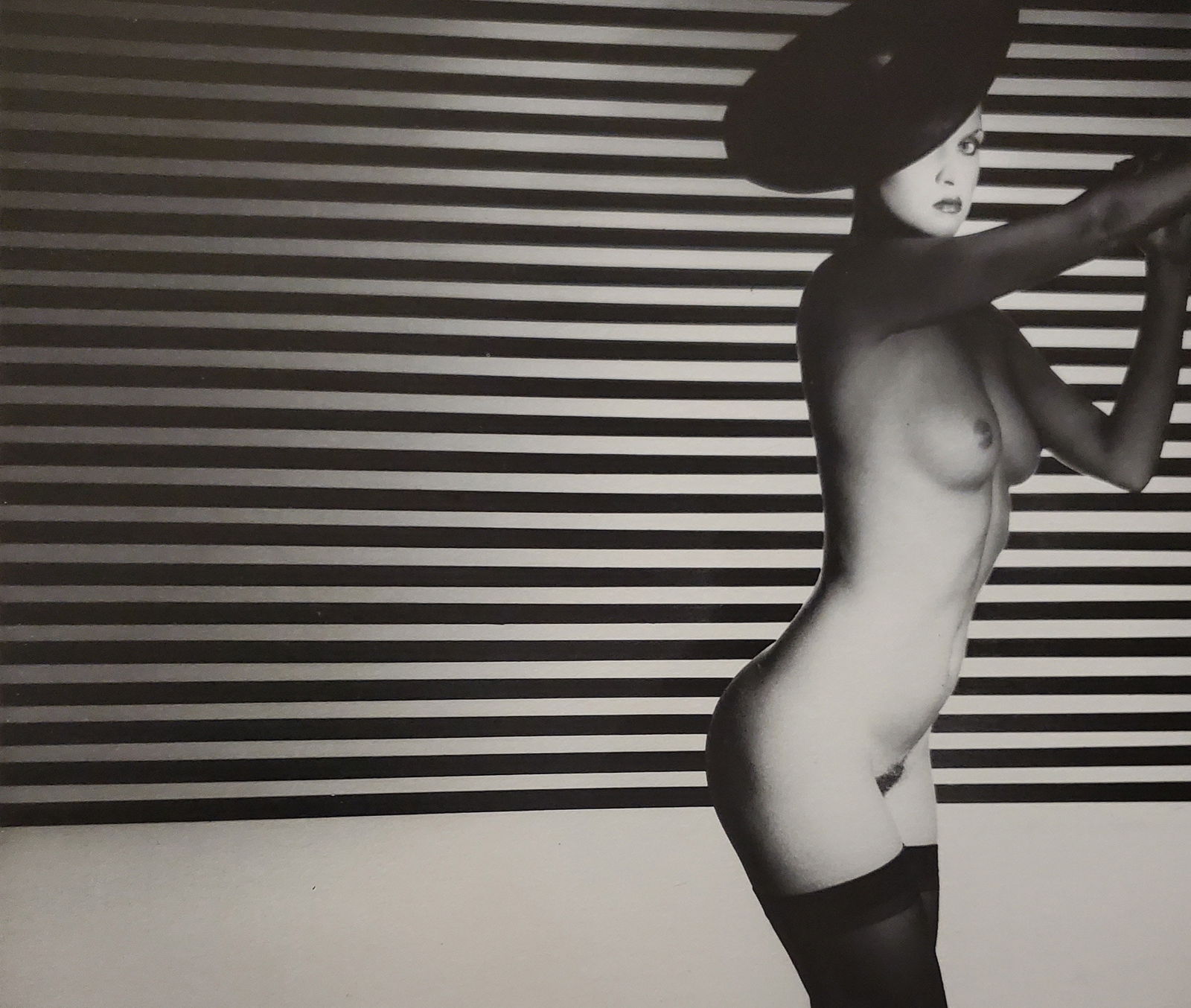 John Swannell, Nude Mime, 1980's: Photographer: John Swannell was born in 1946. After leaving school at 16, he worked first as an assistant at Vogue Studios and then assisted David Bailey for four years before setting up his own studi