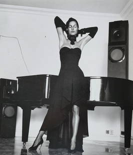 Helmut Newton 'Modeling a Karl Lagerfeld Dress' 1987 - large format: Photographer: Helmut Newton (Germany, 1920 - 2004) - best known for his erotically charged highly stylized images, Helmut Newton was one of the most influential fashion photographers of all time. Titl