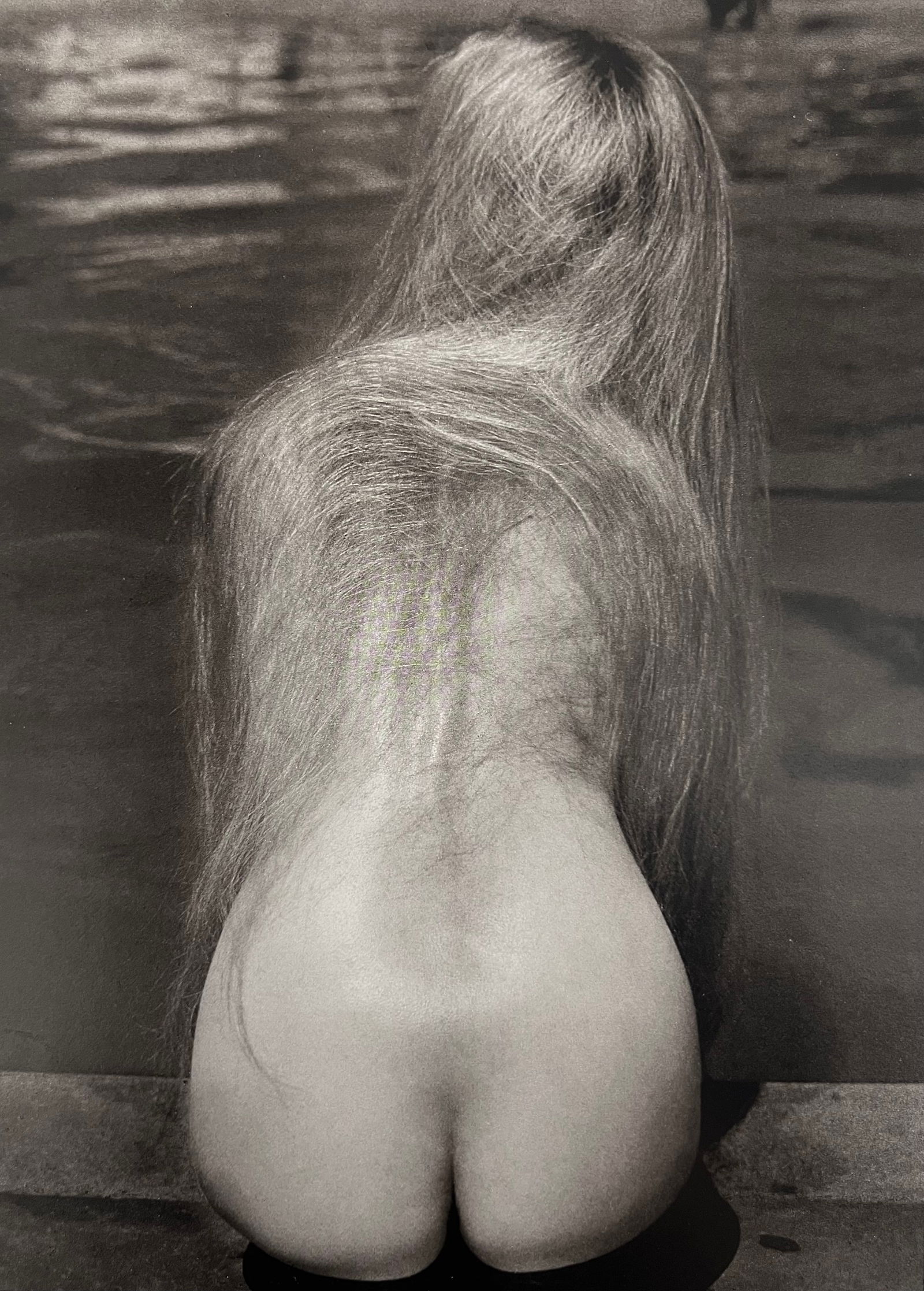 Ruth Bernhard, At The Pool, 1951: Ruth Bernhard (1905-2006) was the daughter of Lucien Bernhard, a graphic designer known as "the father of the German poster." After studying for two years at the Berlin Academy of Art, she came to New