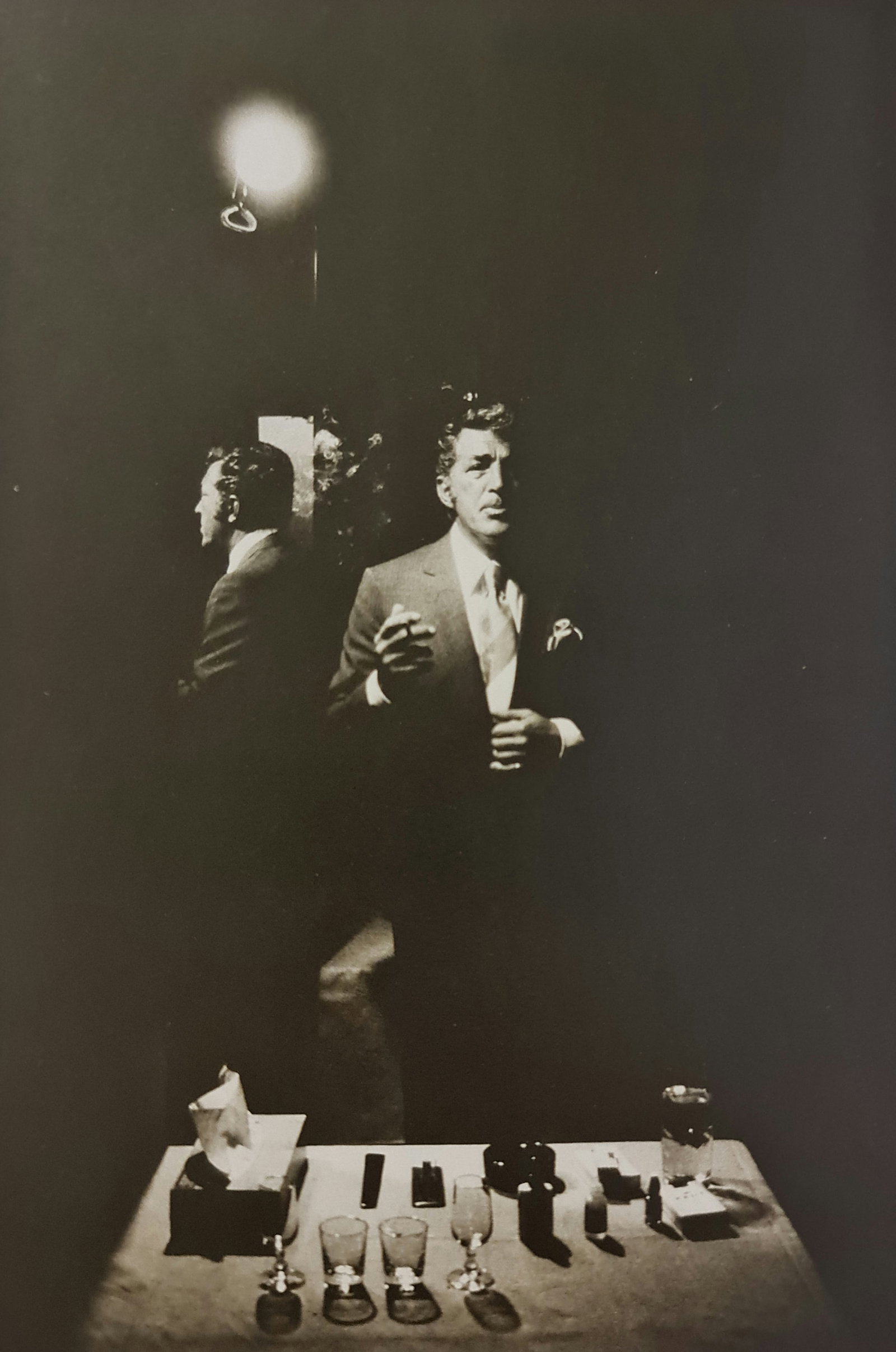 Terry O'Neill, Dean Martin Preparing To Go On Stage At A Las Vegas Night-Club, 1971: Photographer: Terry ONeill was a British photographer, known for documenting the fashions, styles, and celebrities of the 1960s. Title: Dean Martin preparing to go on stage at a Las Vegas night-club D