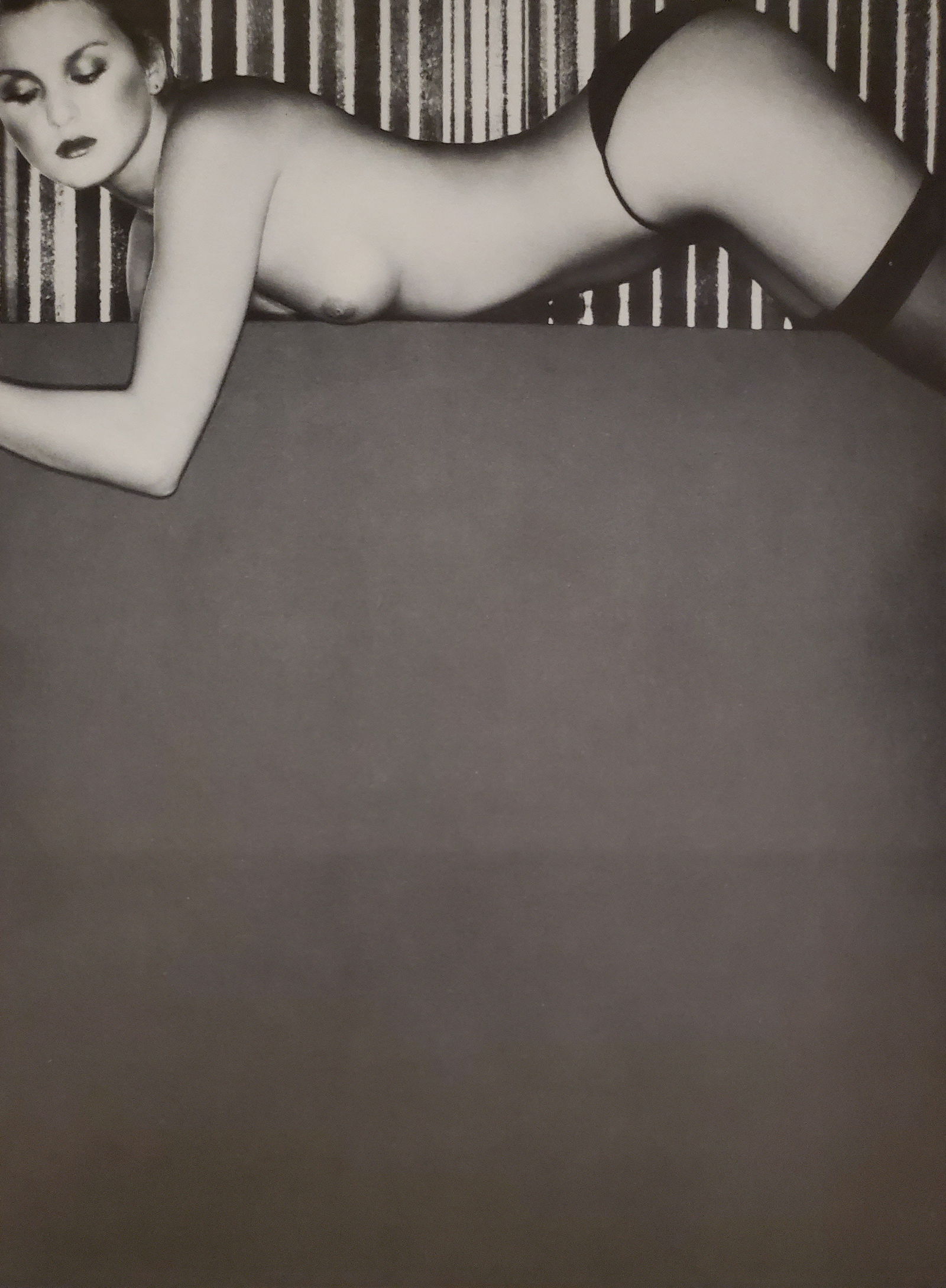 John Swannell, Lady in Repose (left), 1980's: Photographer: John Swannell was born in 1946. After leaving school at 16, he worked first as an assistant at Vogue Studios and then assisted David Bailey for four years before setting up his own studi