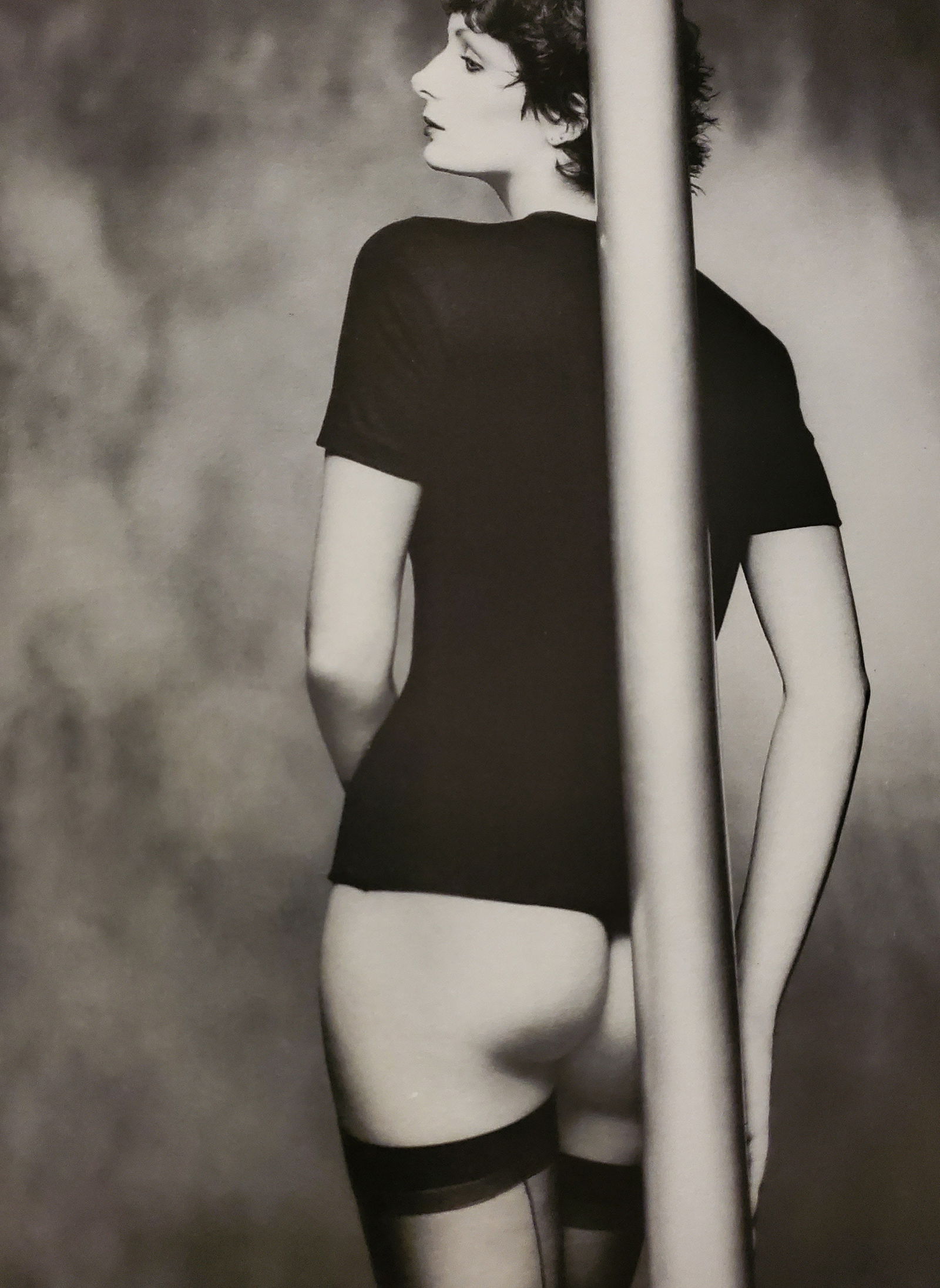 John Swannell, Lady with Pole, 1980s: Photographer: John Swannell was born in 1946. After leaving school at 16, he worked first as an assistant at Vogue Studios and then assisted David Bailey for four years before setting up his own studi