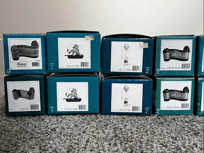 Walt Disney Classic Collection Lot of 20 Figurines: Walt Disney Classics Collection Featuring Mickey Mouse, Minnie Mouse, Winnie the Pooh, Cupid, Lucky, and Simba Sculptures in excellent condition, in original box. There are no scratches, chips or brea