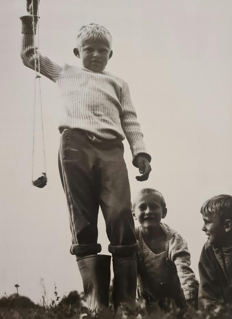 Michel Compte, Boy playing with a sling in Bosnia, 1996: Photographer: Michel Comte (born 19 February 1954) is a Swiss artist, filmmaker, fashion and portrait photographer. Subject/Title: Frida Kahlo Date Of Negative: 1996 Type Of Print: Sheet Fed Photograv