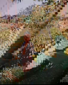 Michel Compte, Boy with homemade toy, old slave plantation, Haiti, 1997