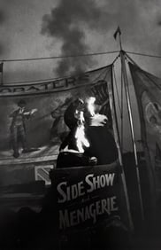 Diane Arbus, Fire Eater at a carnival, Palisades Park, N.J., 1956