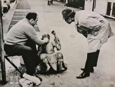 André Kertész, Cleaning up statue, 1959
