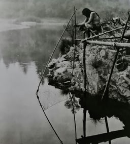 Edward S. Curtis, Fishing In Front Of A Platform